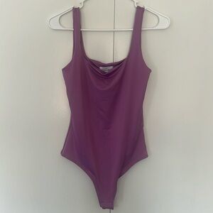 NWT Live in the Moment Purple One-piece Body Suit. Size M.